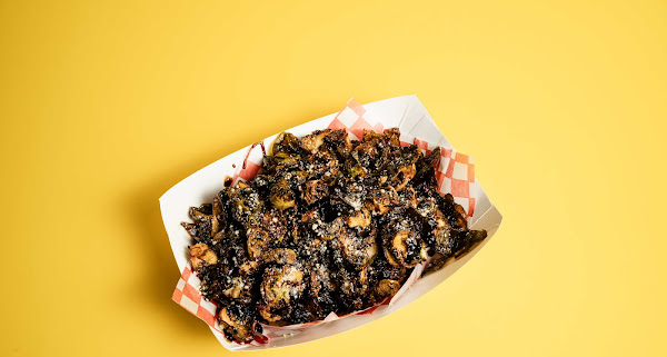 Crispy fries with signature seasoning at JoJo's Chicken Shack